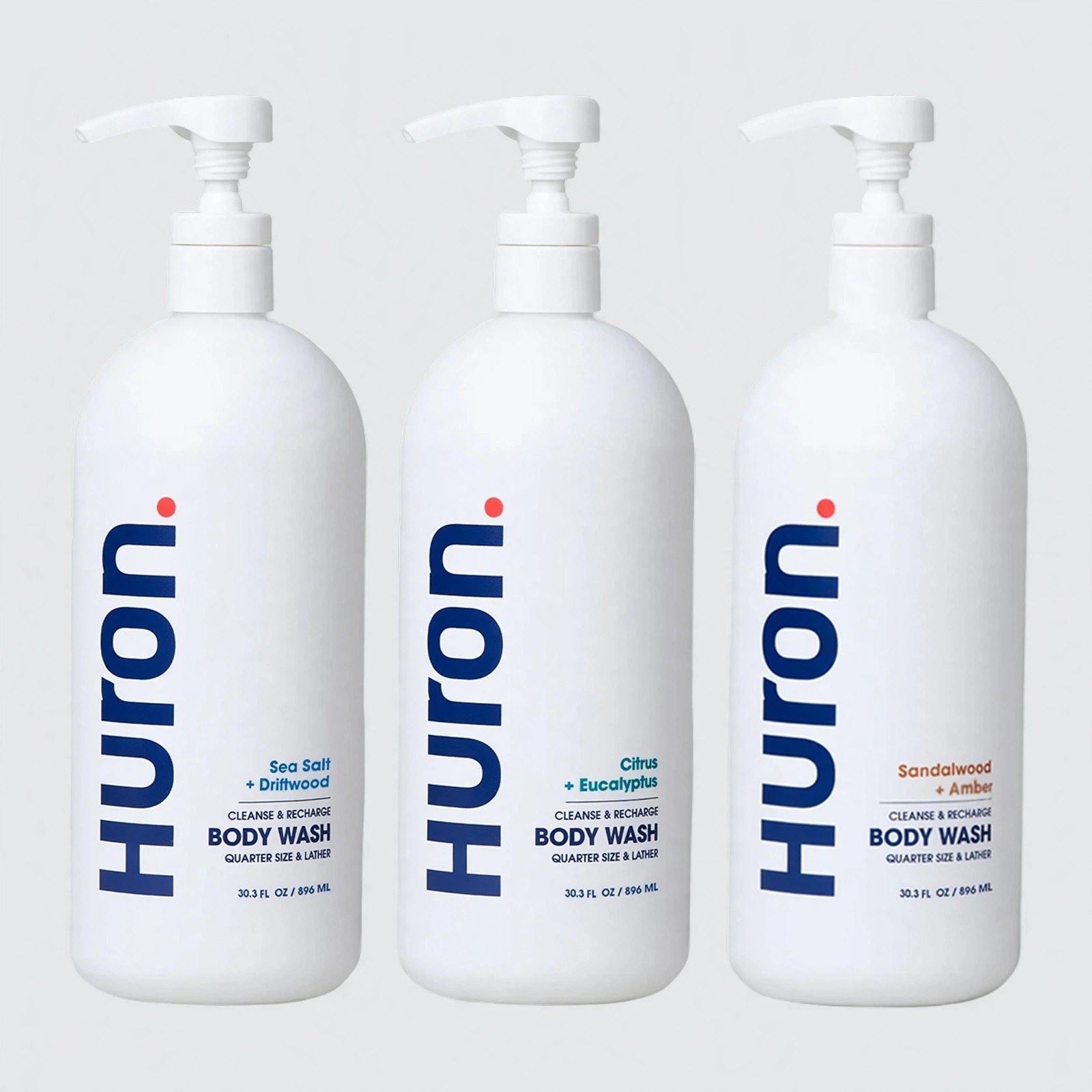 Huron Body Wash bottles displayed against gray background.